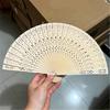 Portable Traditional Engraved Wooden Folding Fan With Lightweight Design Ideal For Cultural Celebrations
