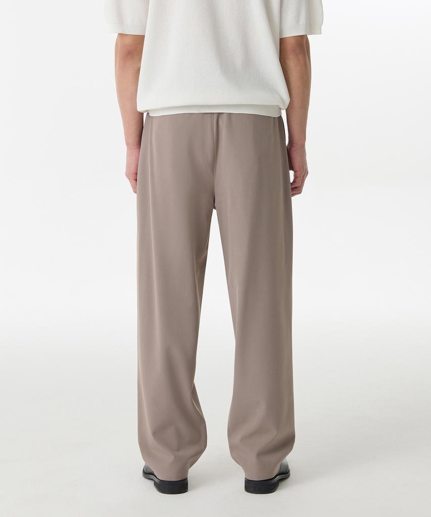 MUSINSA STANDARD One-Pleat Loose Tapered Hidden Banding Slacks [Grayish Beige]