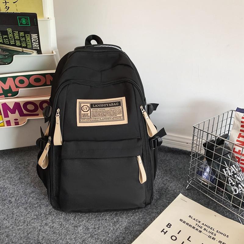 Backpack female new college student simple travel computer backpack high school junior high school student large capacity schoolbag male