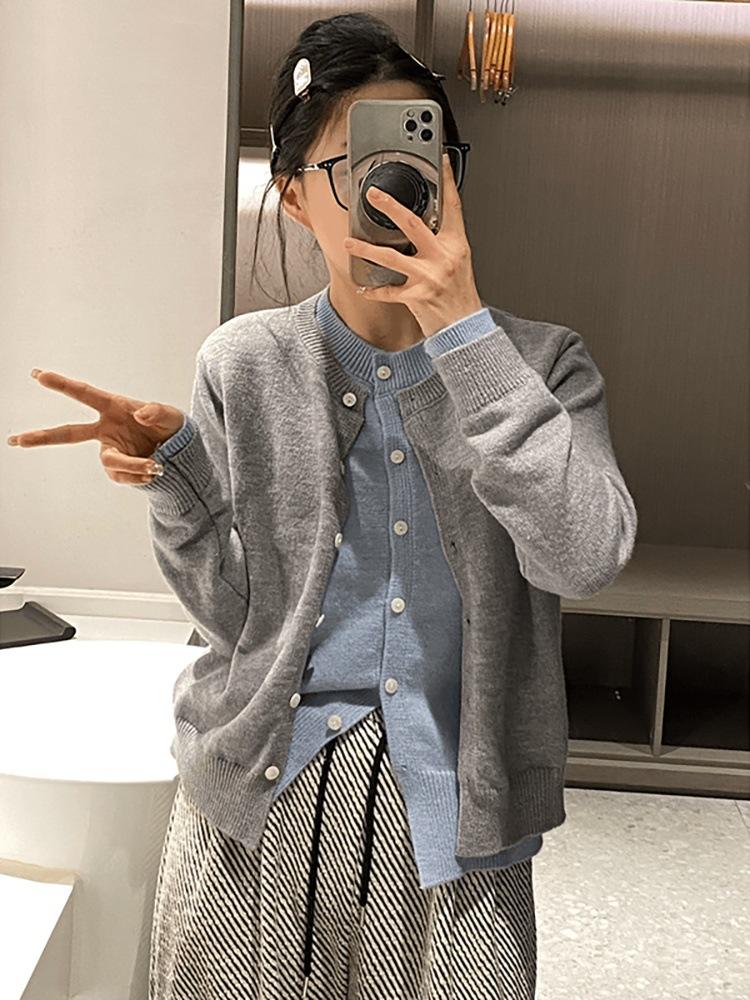 Fashion fake two-piece single-breasted knitted cardigan jacket women's spring and autumn round neck front shoulder top soft waxy sweater