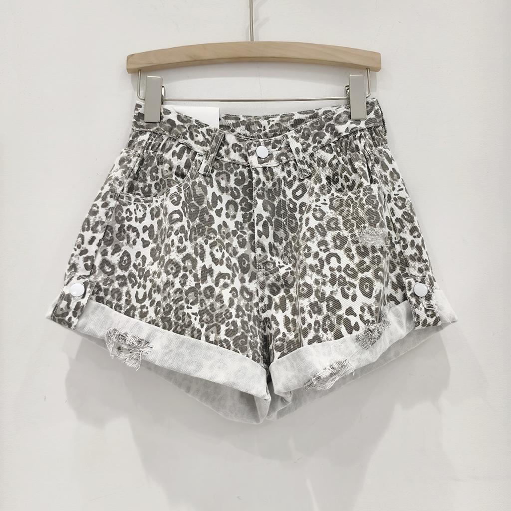 Moda estiva a-line pantaloni corti larghi arricciati vita alta versatili stampa leopardata denim lavato strappato pantaloncini donna tendenza