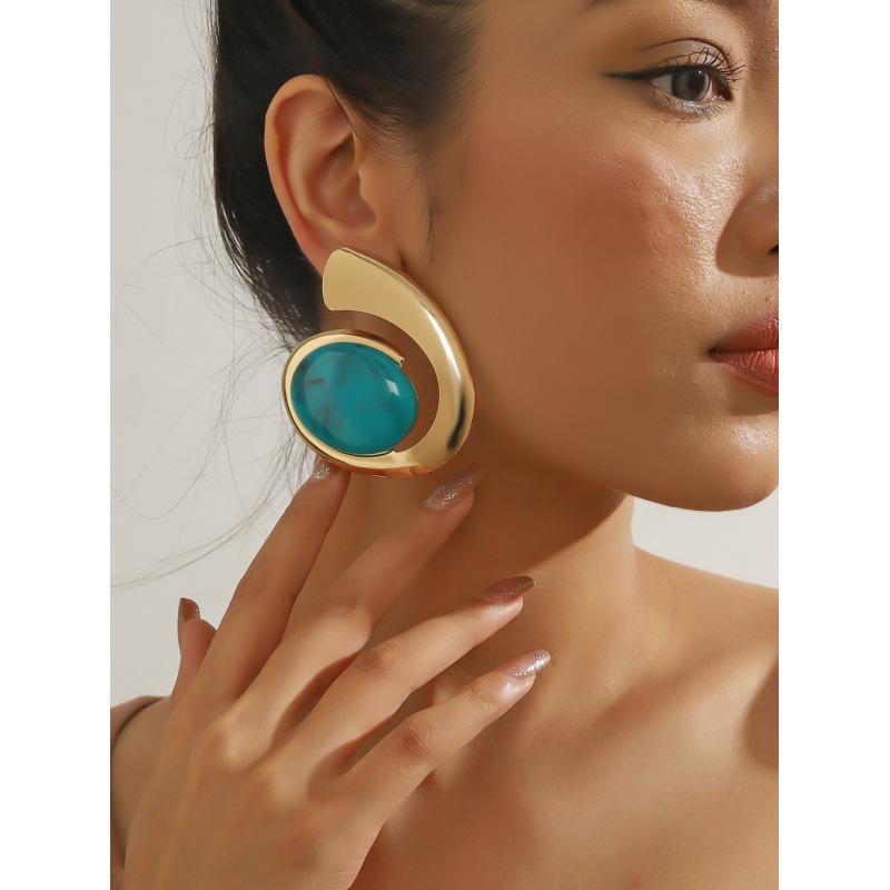 Turquoise Trendy Statement Earrings: Unique Summer Design for a Bold Look.