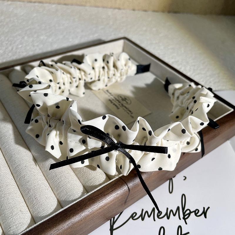 

Широкая повязка на голову с бантом в горошек - Универсальный и модный аксессуар для волос для женщин.