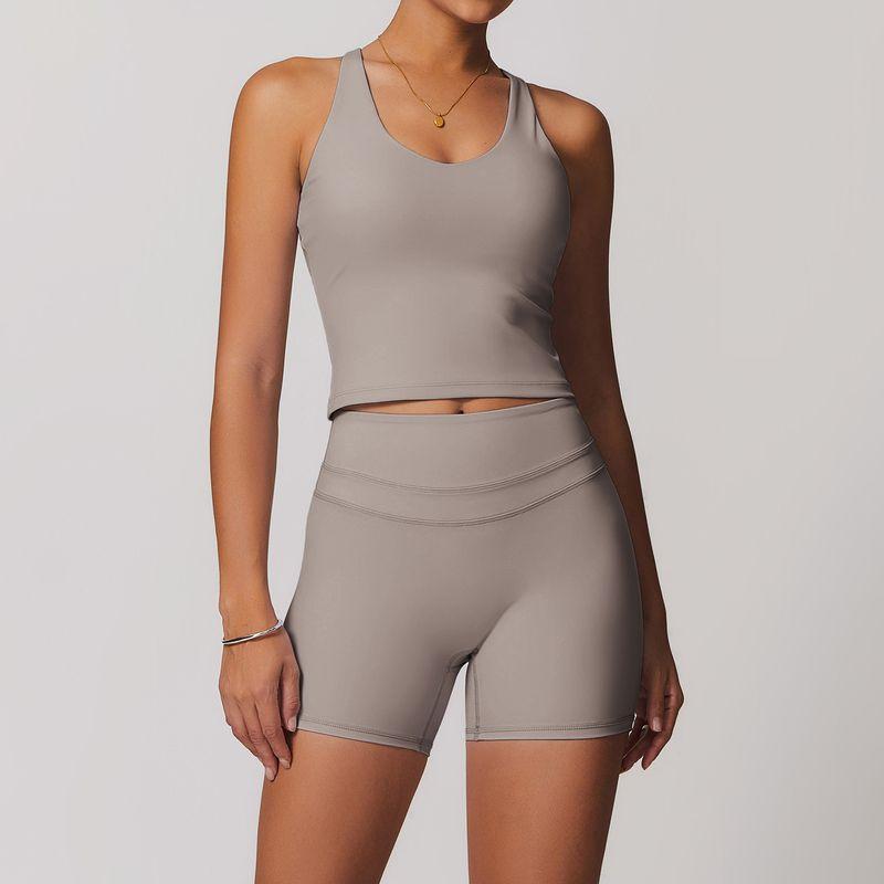Guangzhou Zechuang Clothing Co., Ltd. Brushed Tight Back Yoga Suit Stretch High Waist Workout Clothes for Women Running