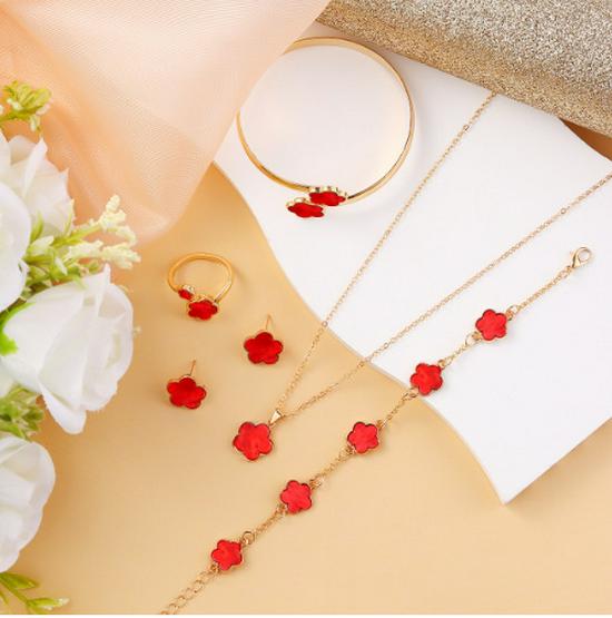 Lucky Flower Jewelry Set: Acrylic Bracelet, Five-Leaf Clover Necklace, Ring, and Earrings for Women.