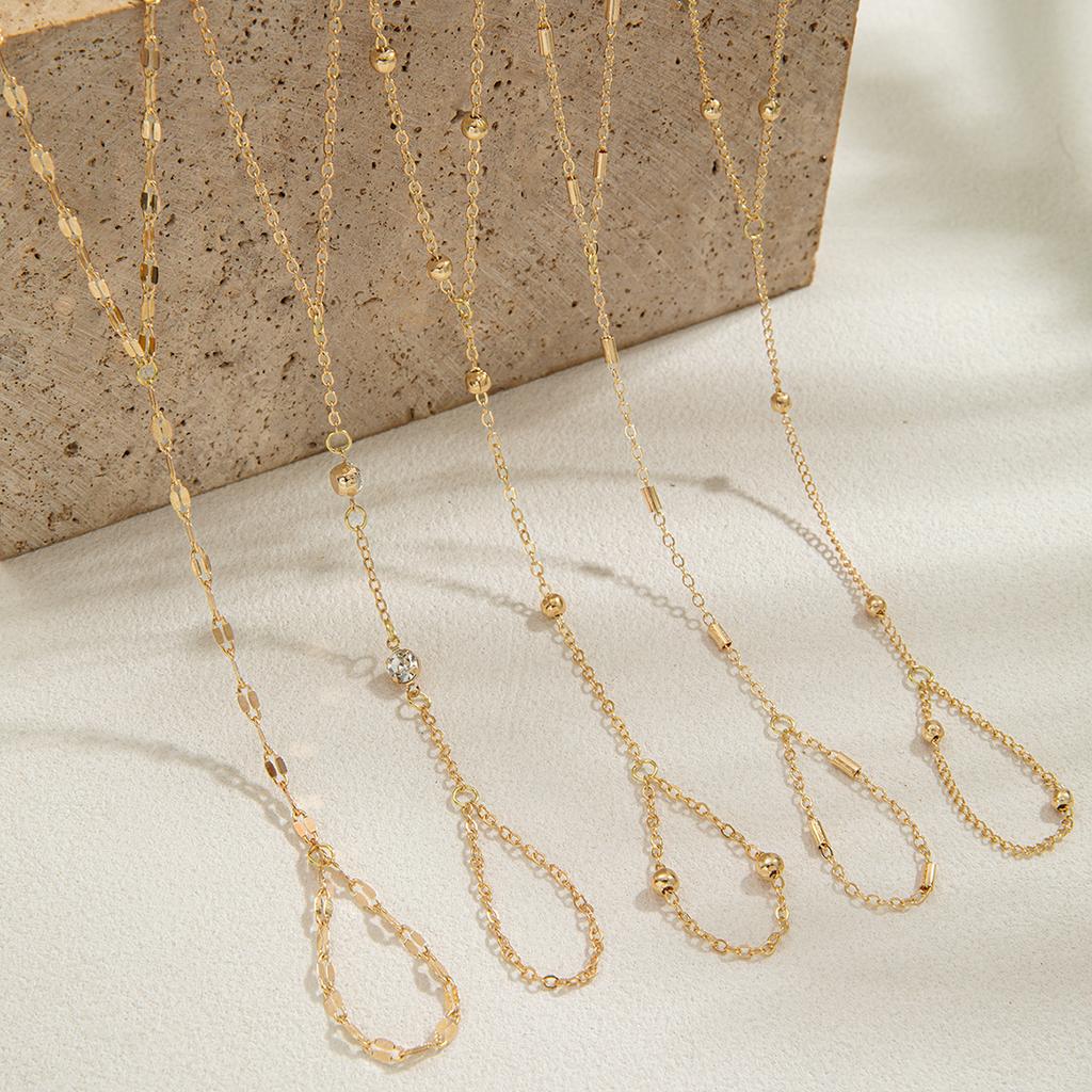 Niche Gentle Style Golden Beaded Finger-connected Bracelet, Integrated Ring Bracelet