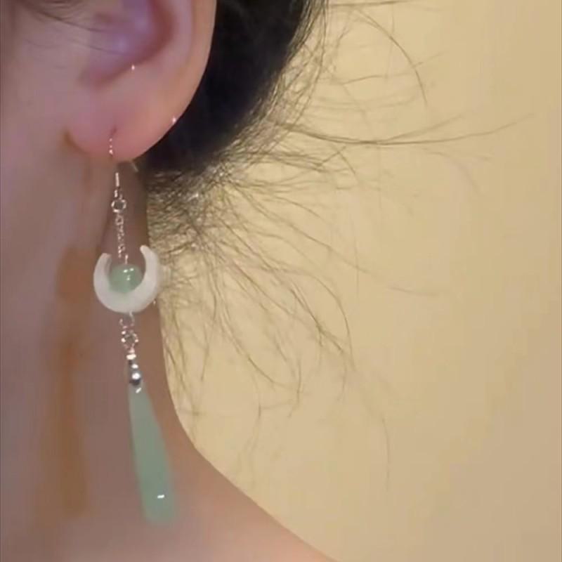 Chinese Jade Moon Tassel Earrings: Unique Design & Elegant Trend