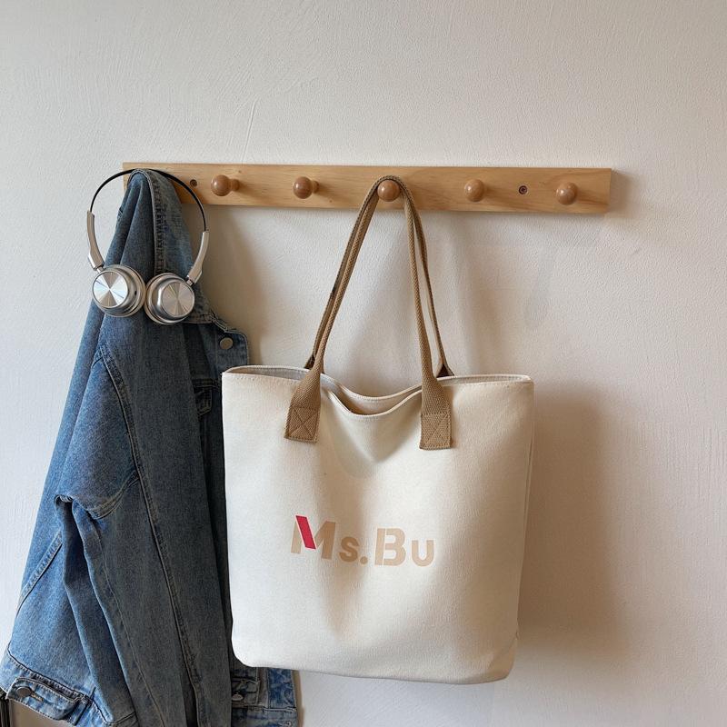 Canvas bag women's large-capacity new autumn and winter versatile shoulder bag casual college student class tote bag