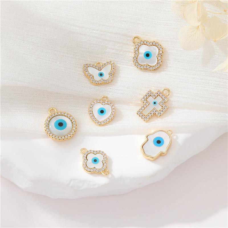

Zhongxing 14K Gold Natural Seashell Heart & Evil Eye Zircon Pendant Necklace