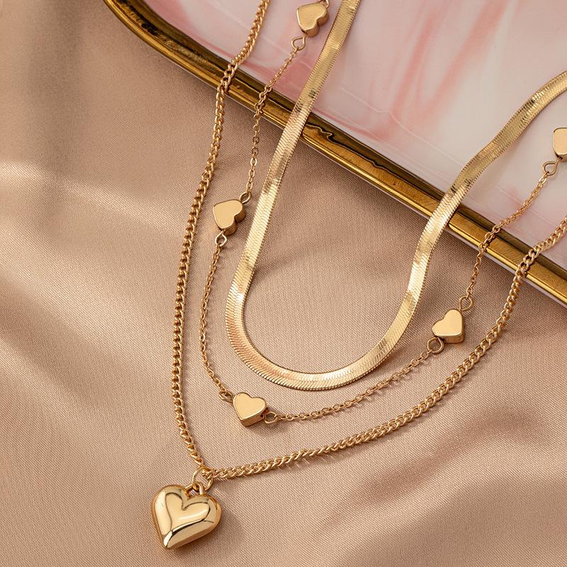 Hot-selling layered love necklace design necklace stacked collarbone chain high-end light luxury snake bone chain