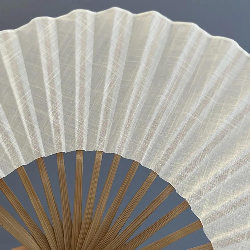 Cotton Linen Cloth Folding Hand Fan Bamboo Frame with Tassel Mini Shell Fan Shell-Shaped Decoration Retro Handheld Fan