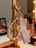 Dior Beauty Peripheral Keychain, Pink Ribbon Pearl Bag Charm, Brand Cosmetic Accessory, CD Star Metal Pendant Key Ring for Women