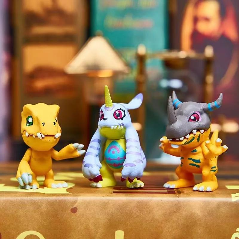 9-piece set of cute Japanese Digimon Adventure anime figures, including Agumon, Patamon, and Gabumon. PVC tabletop figurines.