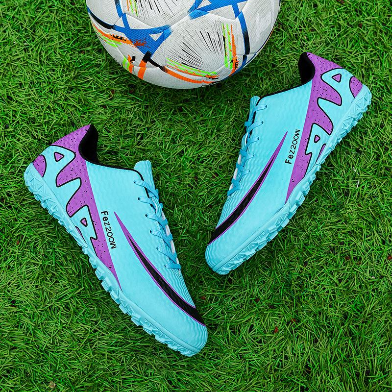 Overseas men's and women's low-top breathable football shoes indoor and outdoor sports shoes professional competition shoes