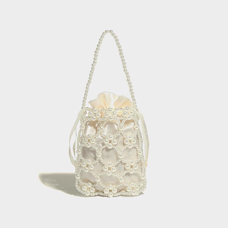 

2024 новая литературная и высококачественная портативная сумка Mori с жемчужным переплетением и бусинами, ажурный дизайн, одно плечо, косая сумка