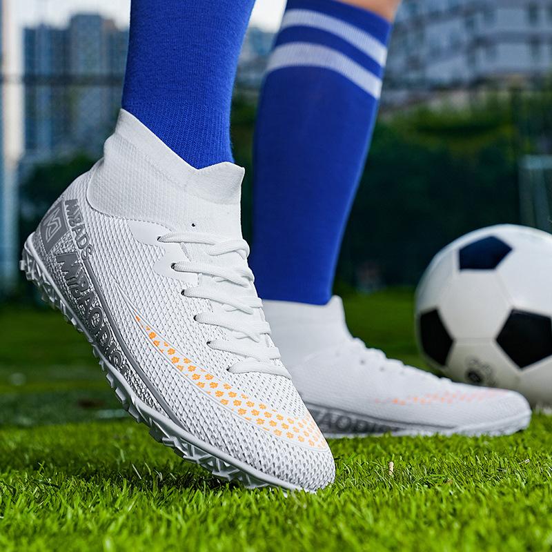 Nowe buty piłkarskie wysokie męskie młodzieżowe buty z długimi korkami Mundial buty sportowe dla studentów