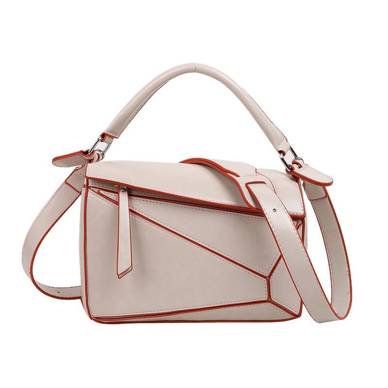 

New geometric bag classic versatile handbag women s bag casual fashion shoulder bag niche light luxury women s messenger bag білий