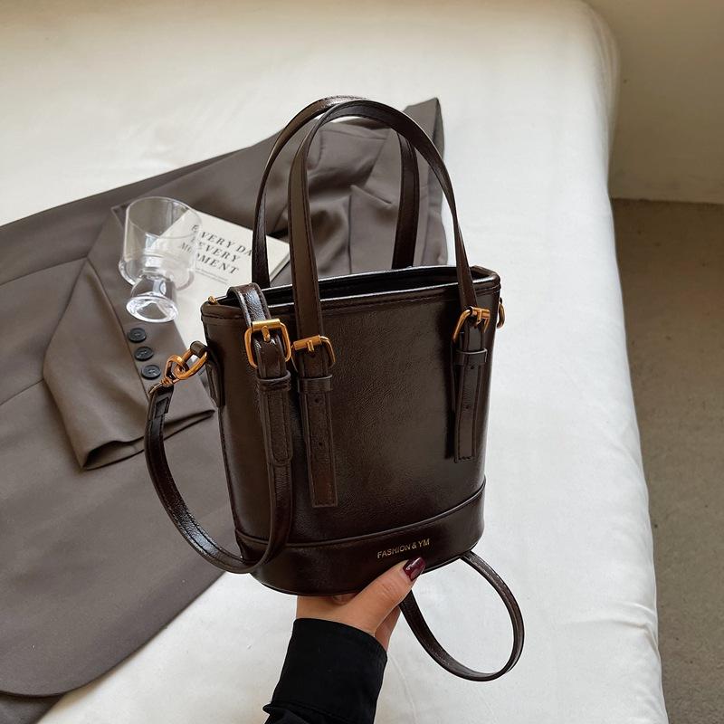 2025 New Fashion Foreign Style Korean Hand Carrying Bucket Bag Simple Casual Versatile Commuter Shoulder Messenger Bag Women