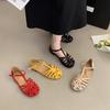 2025 New Retro Woven Baotou One-word Buckle Flat-soled Sandals Women's Summer Wear Hollow Pig Cage Shoes Roman Women's Shoes
