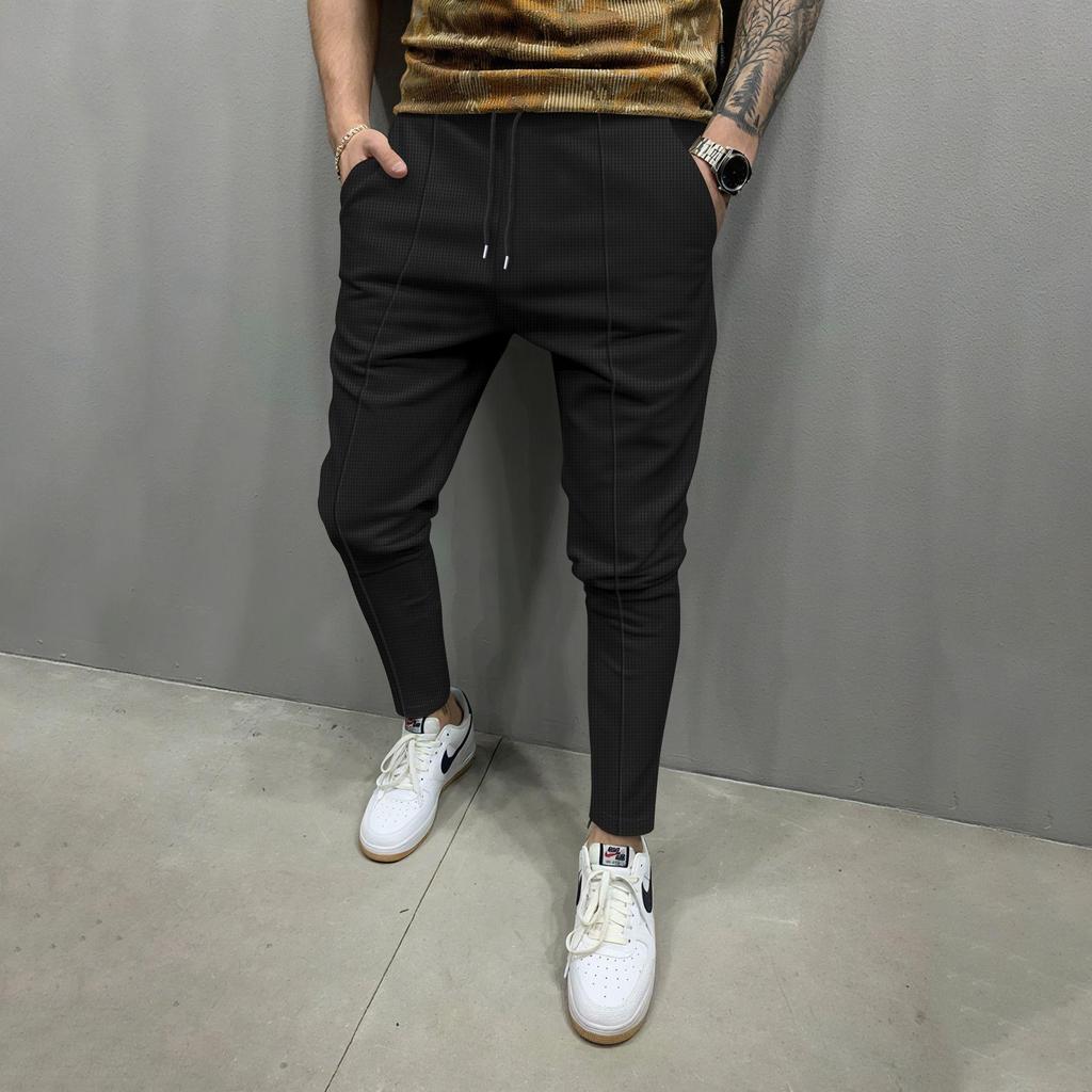 Four Seasons Men's New Solid Color Tethered Trousers Loose Casual Sports Elastic Waist Straight Pants