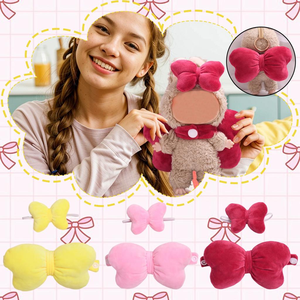 A Pair Of Cute Baby Clothes With Big Bow Accessories