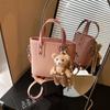 Textured Portable Bucket Bag Women's 2026 Spring New Fashion Light Luxury Shoulder Messenger Bag