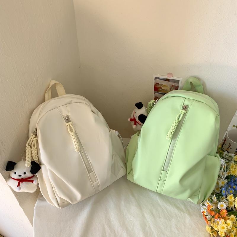 School bag female college students simple niche design sense backpack high value junior high school students leisure travel backpack