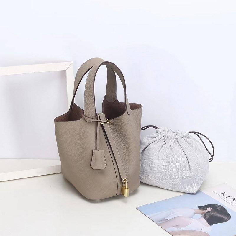 First-layer Lychee Pattern Leather Bucket Bag Brand Fashionable Gold Button Cowhide Vegetable Basket Women's