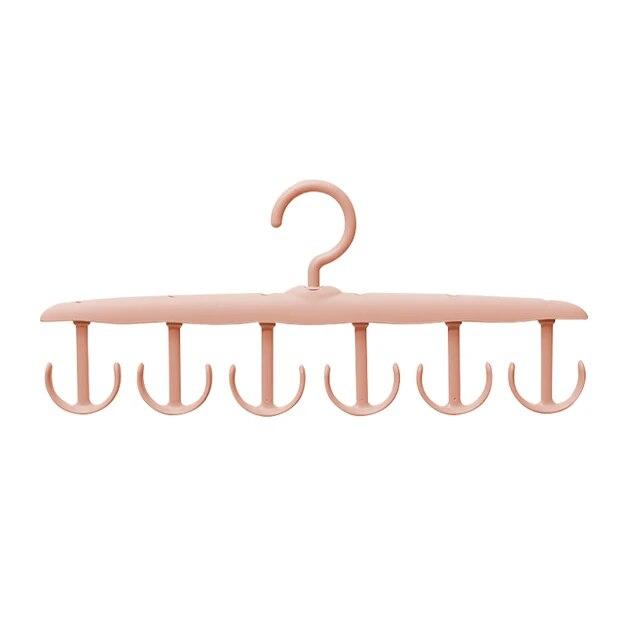 Multifunktionale Kleiderbügelständer unterstützen das kreisförmige Trocknen von Schals und Socken aus Kunststoff und sind Aufbewahrungsregale für Krawattengürtel und BHs