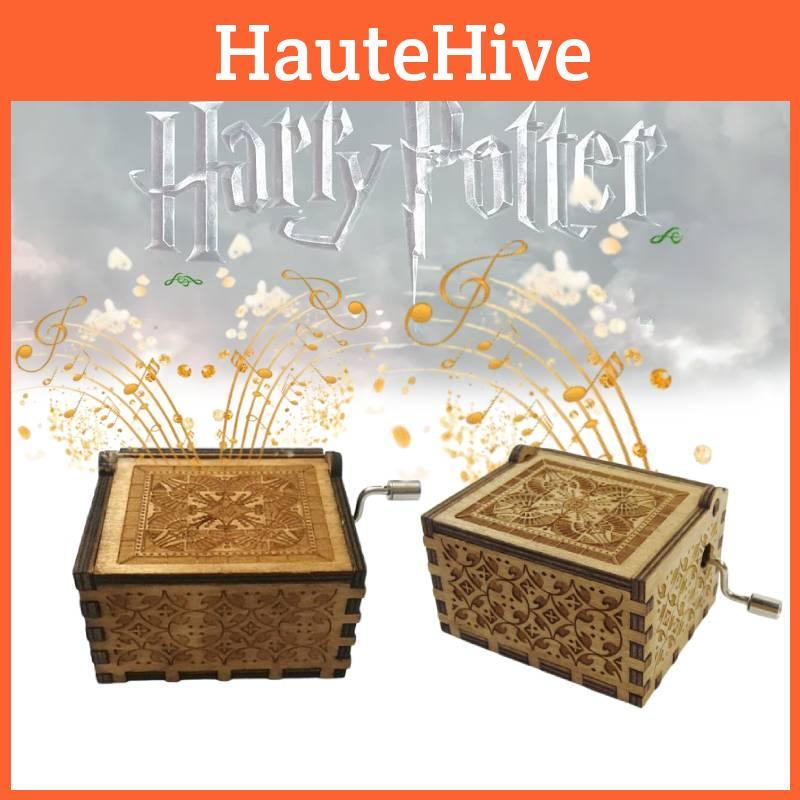 Harry Potter I Kamień Filozoficzny Drewniana pozytywka z rzeźbieniami na prezent. Zawiera specjalne postacie.