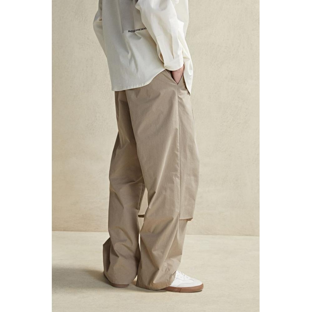 

Брюки свободного кроя HM бежевые