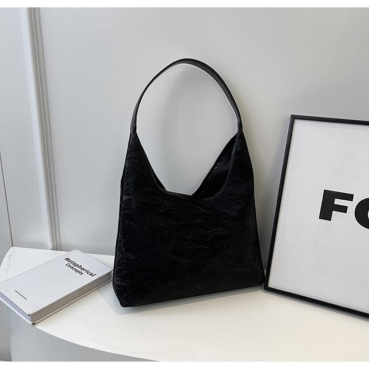 

Korean version of women s bags, high-end sense, large-capacity armpit bags, 2025 summer new simple solid color shoulder bags, commuter bags