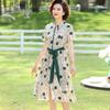 Robe d'été élégante à manches courtes et coupe évasée, à motif floral, pour femmes d'âge moyen