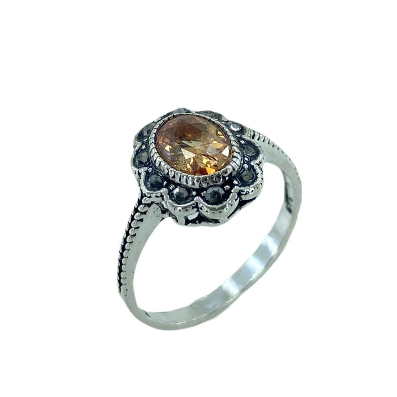 

Аутентичное серебряное кольцо 925 пробы с марказитом и крошечным камнем цитрином