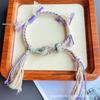 Tibetan Wealth Gods Handmade Eight-Strand Braided Bracelet with Green Tara Thangka