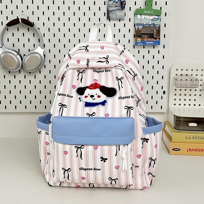 

New high-value, fresh, sweet and cute bow puppy backpack, junior high school student backpack