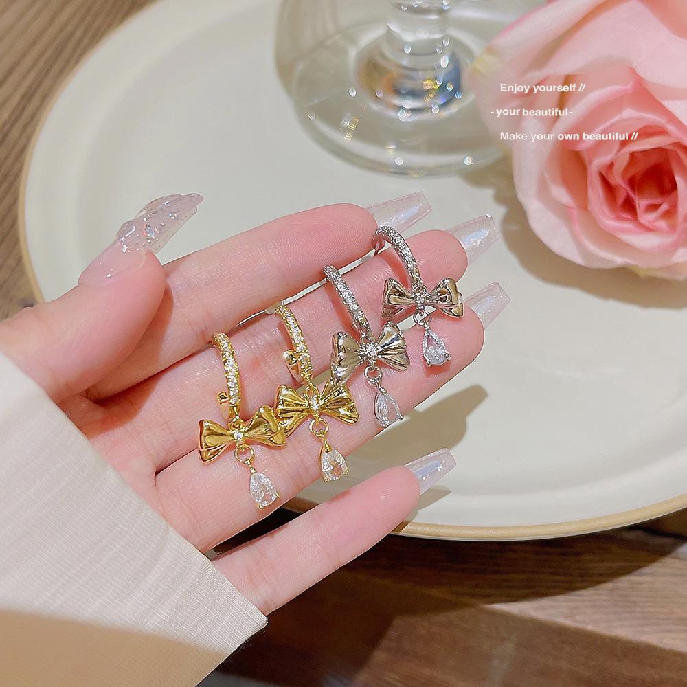 

Elegant Silver Needle Bow Earrings: High-End Light Luxury Vintage Style for Women