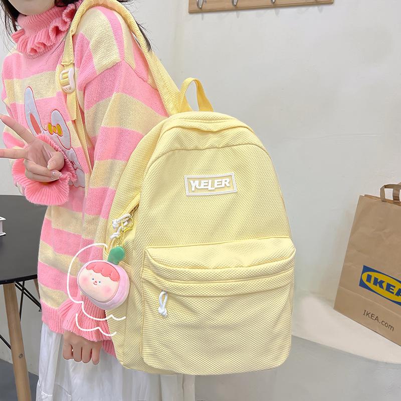 Student backpack Women's new large-capacity outdoor lightweight schoolbag Middle school student candy-colored backpack