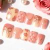 30-teilige Süße Goldfolien-Schleife Herz Mandel Kurze Nagelkunst-Tipps