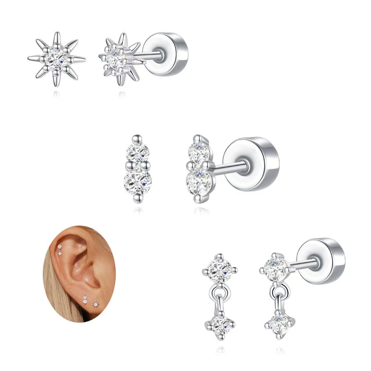 

Позолоченные латунные серьги-пусеты в виде восьмиконечной звезды с цирконами