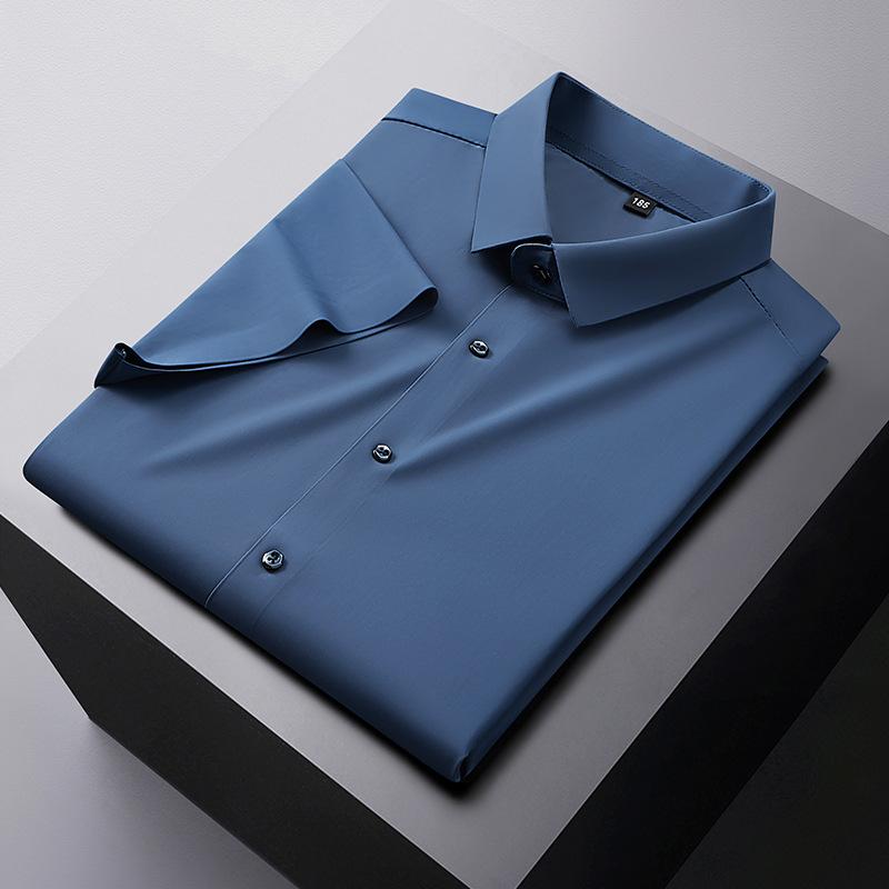 

Summer large size men s clothing seamless non-ironing high elastic ice silk short-sleeved shirt fattened and enlarged thin solid color shirt fat 8209*225/159 peacock синього кольору