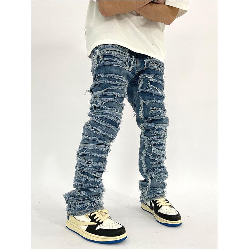 American Style Distressed Slim-Fit Jeans with Whisker Washing and Patch Details.