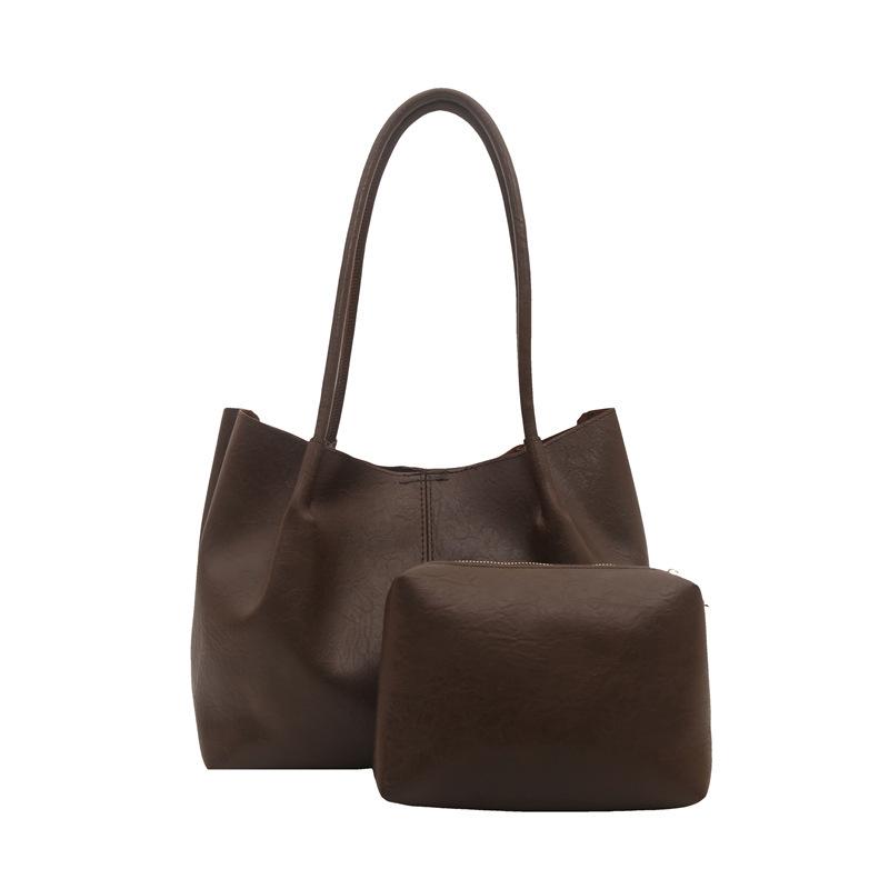 Spring new bag women's fashion soft leather versatile commuter tote bag large capacity shoulder armpit bag