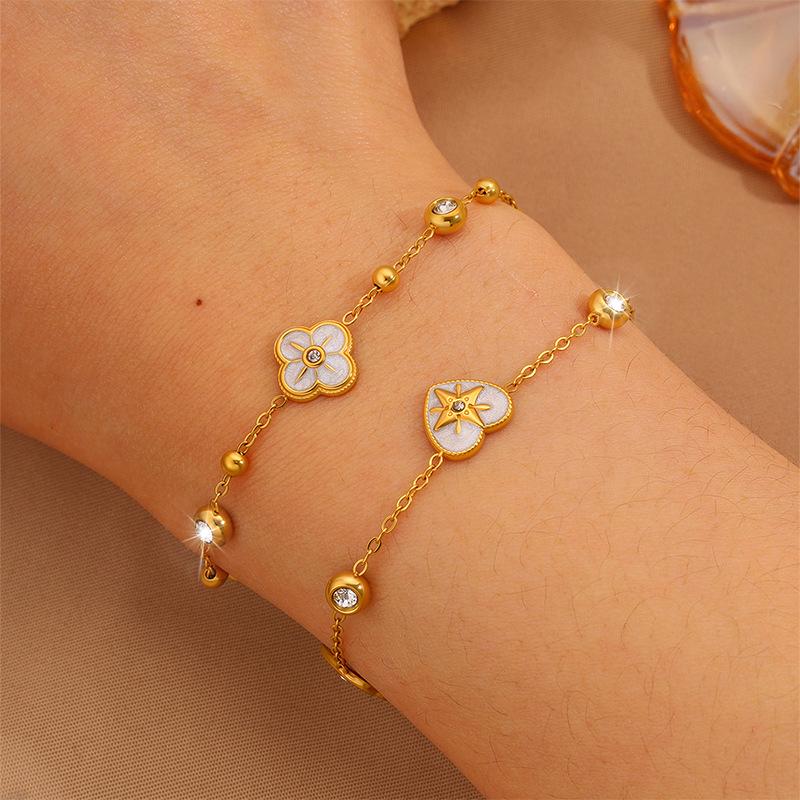 Elegant Women's Titanium Steel Bracelet with Diamond-Embedded Four-Leaf Clover and Eight-Pointed Star Design