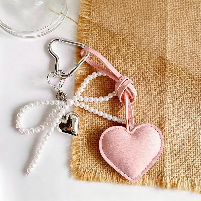 Yogodlns Fashion PU Bow Heart Long Tassel Glossy Leather Love Heart Pendant Pearl Bow Bag Charm Accessories one size розовый