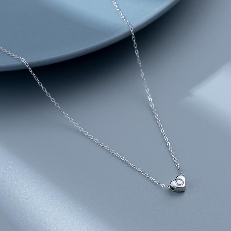 S925 Silver Heart-Shaped Initial Necklace - Korean Style Clavicle Chain with Trendy Peach Heart Design.