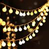 Outdoor Waterproof Solar LED Frosted White Ball String Lights for Camping and Festival Decorations.