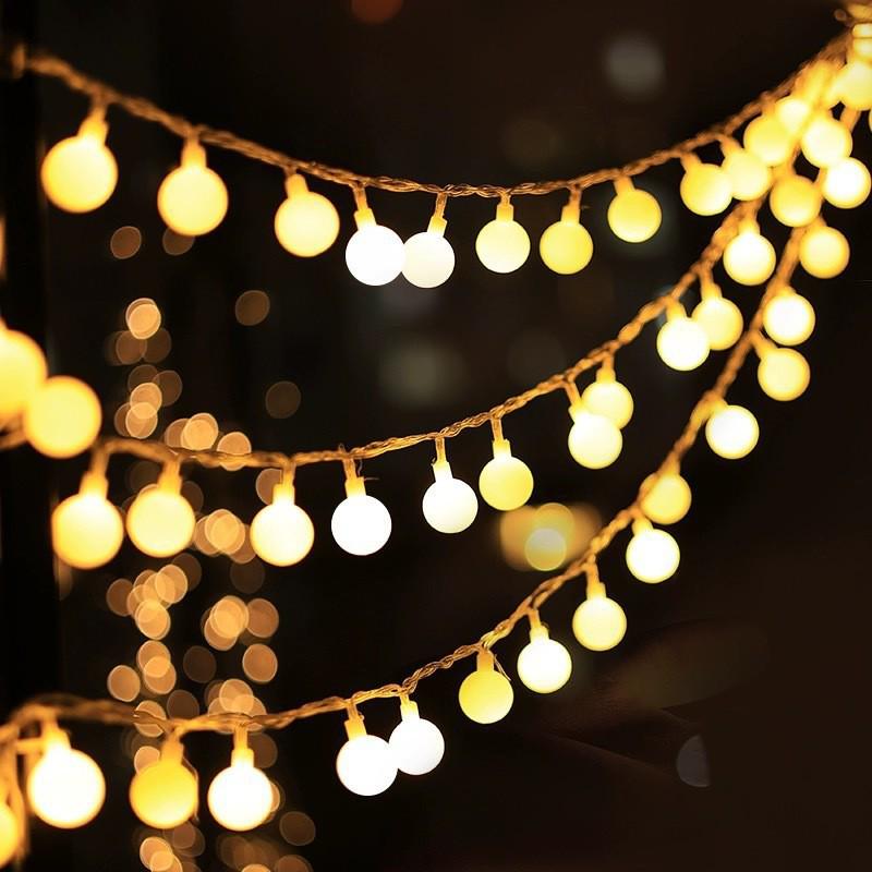 Outdoor Waterproof Solar LED Frosted White Ball String Lights for Camping and Festival Decorations.