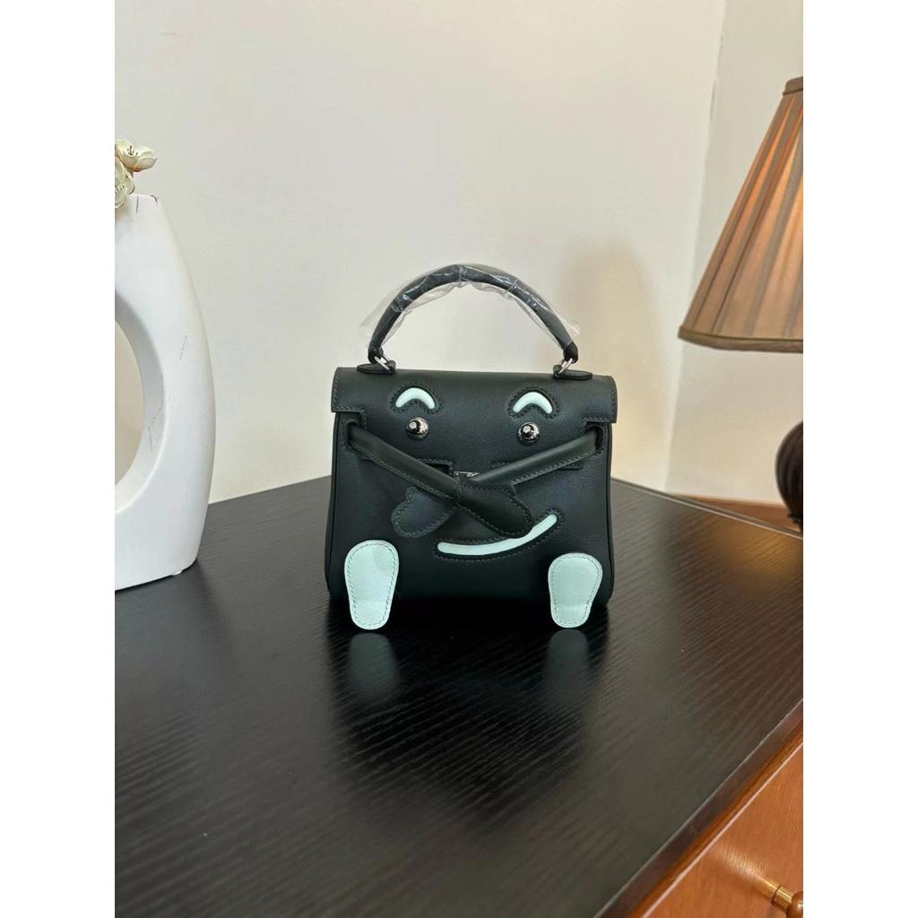 Borsa a faccina sorridente nuova per la primavera e l'estate 2025 borsa Kelli mini in pelle bovina di primo strato di alta gamma borsa a tracolla carina da millenial