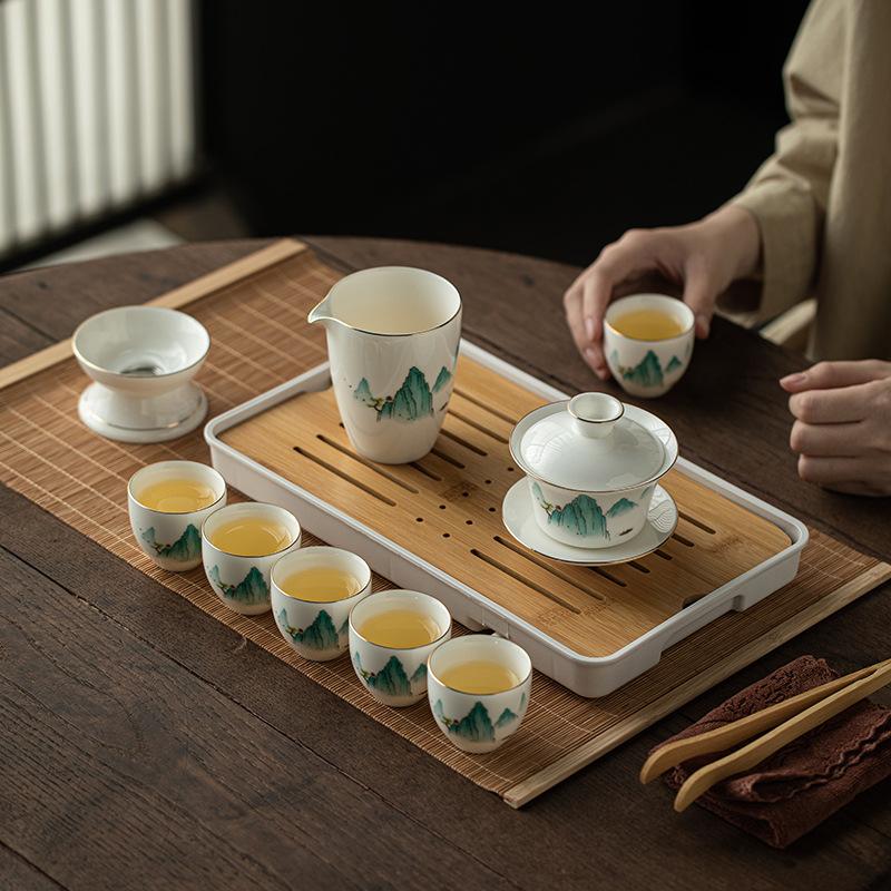 Portable outdoor travel suet jade porcelain kung fu tea set gift box, household cover bowl tea set, accompanying gift